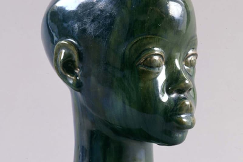 Sargent Claude Johnson sculpture of the head of a boy.