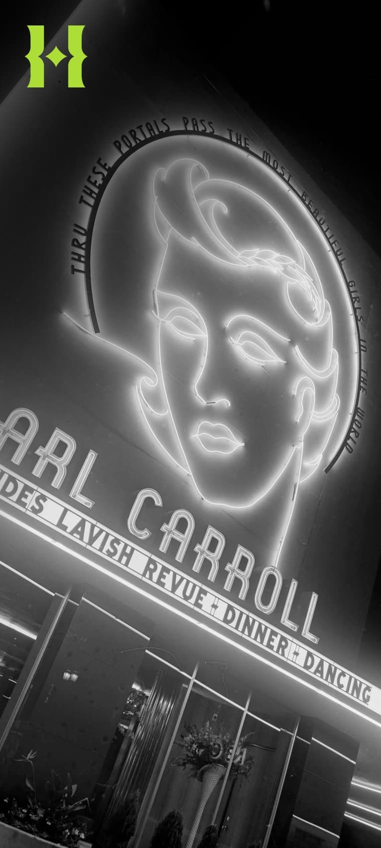 A black and white photo of a theatre sign.