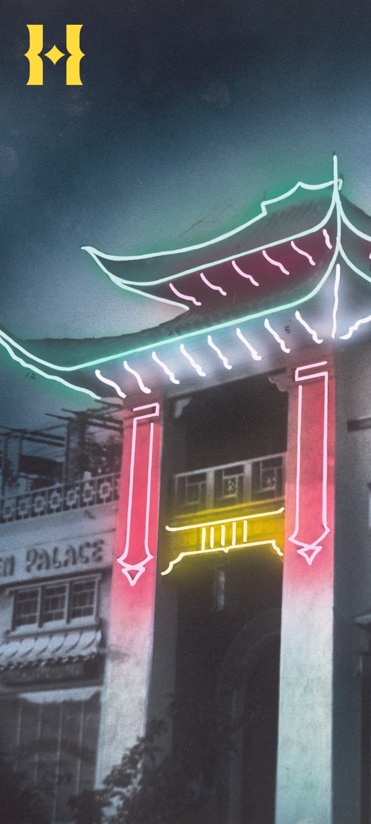 A Chinese-style building with neon lights along the roof.