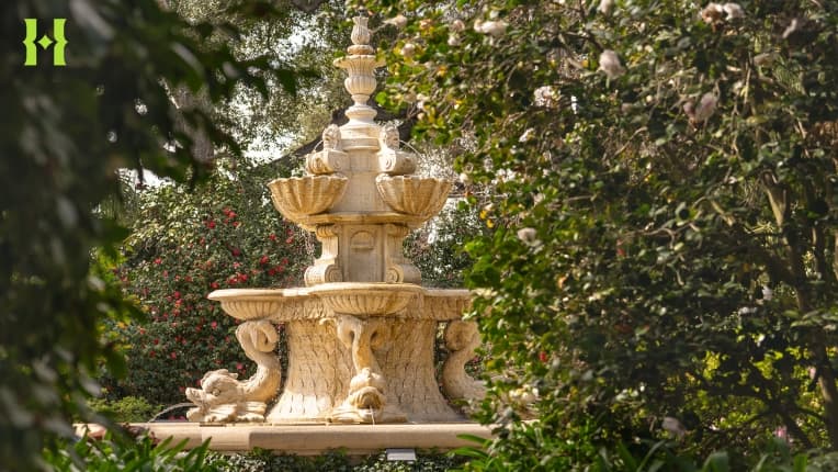 A tiered fountain in a garden.