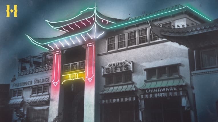 A Chinese-style building with neon lights along the roof.