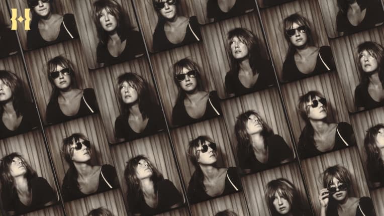 A series of sepia tone photo strips depicting a person with messy hair and sunglasses.